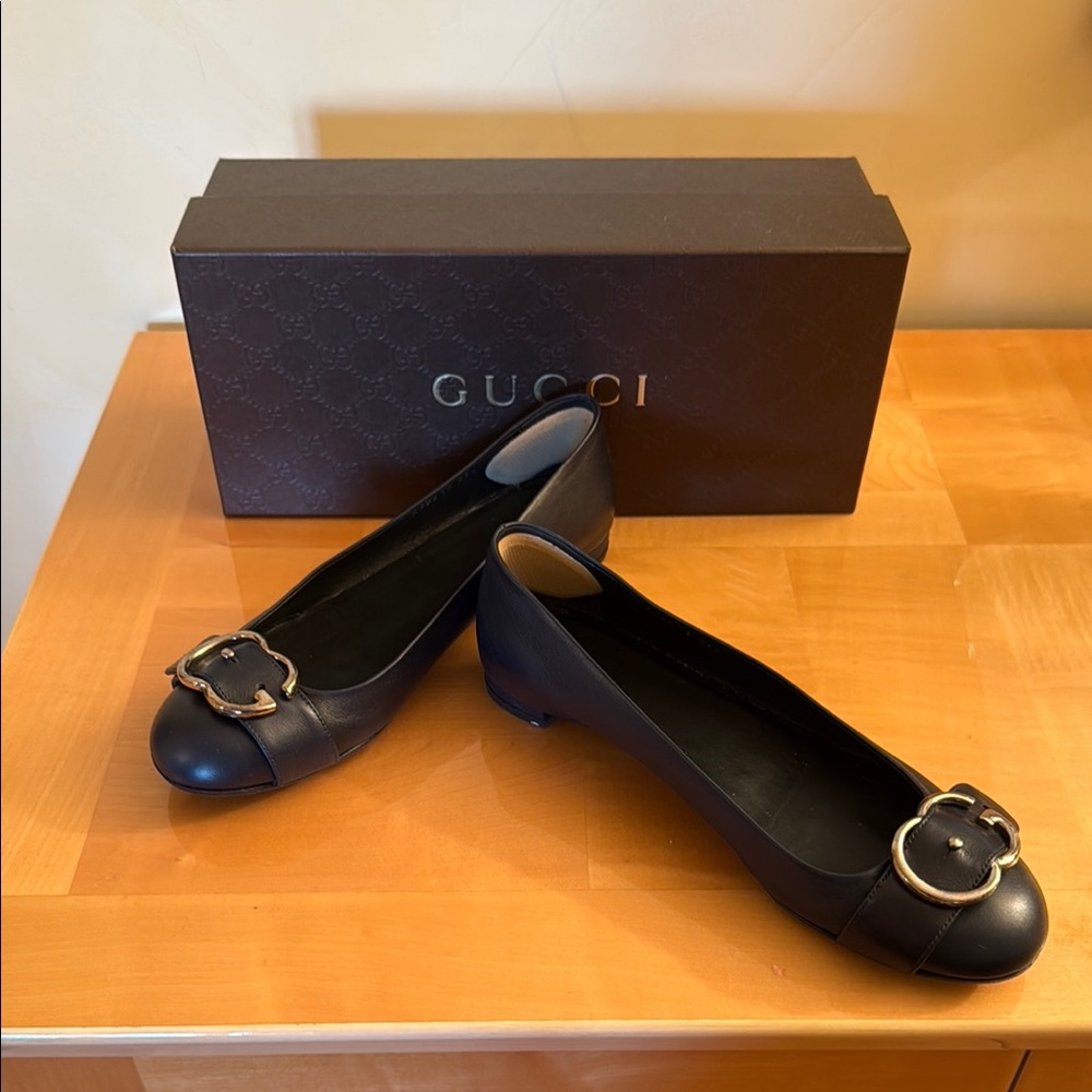 Gucci Black Leather Flats with Gold Buckle